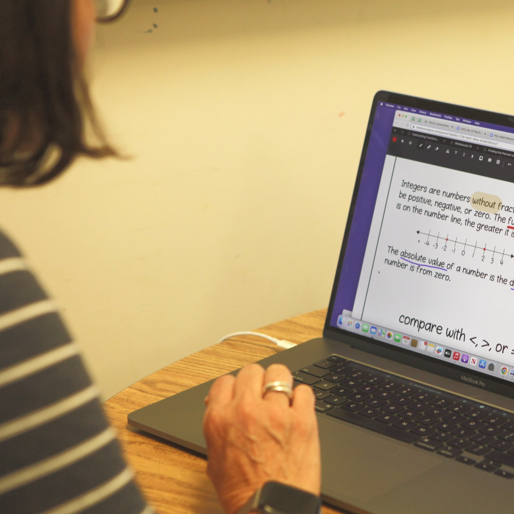 A student working through a number line lesson with a tutor online